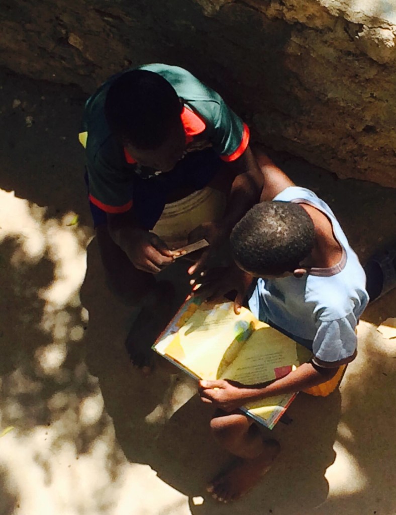 They like to come to read. The older boys age 13 and up can read. The younger boys and girls cannot read yet so either I read or one of the older boys take turns reading. We read from the Jesus Storybook Bible in Creole and the kids love it. They beg to take it home with them every single time. The mother's of these children cannot read. I have promised them that when we have finished reading the entire picture Bible together they may take it home.