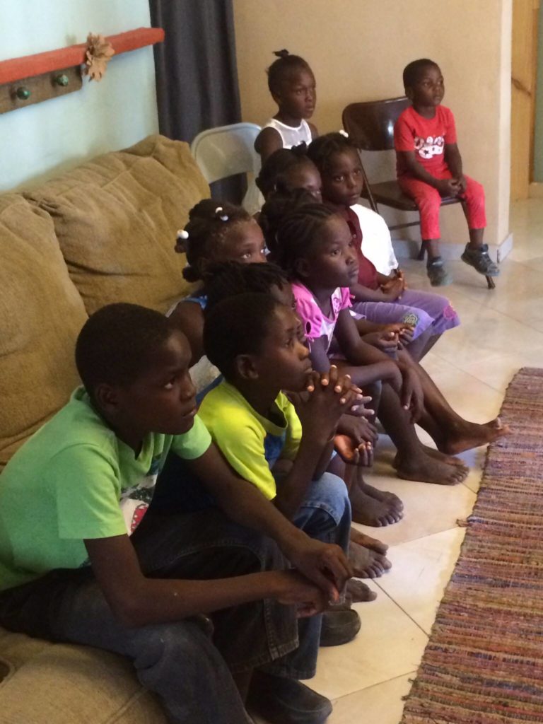 Occasionally they come to listen to Bible stories and songs. I am always in awe of how many kids can fit on one couch!